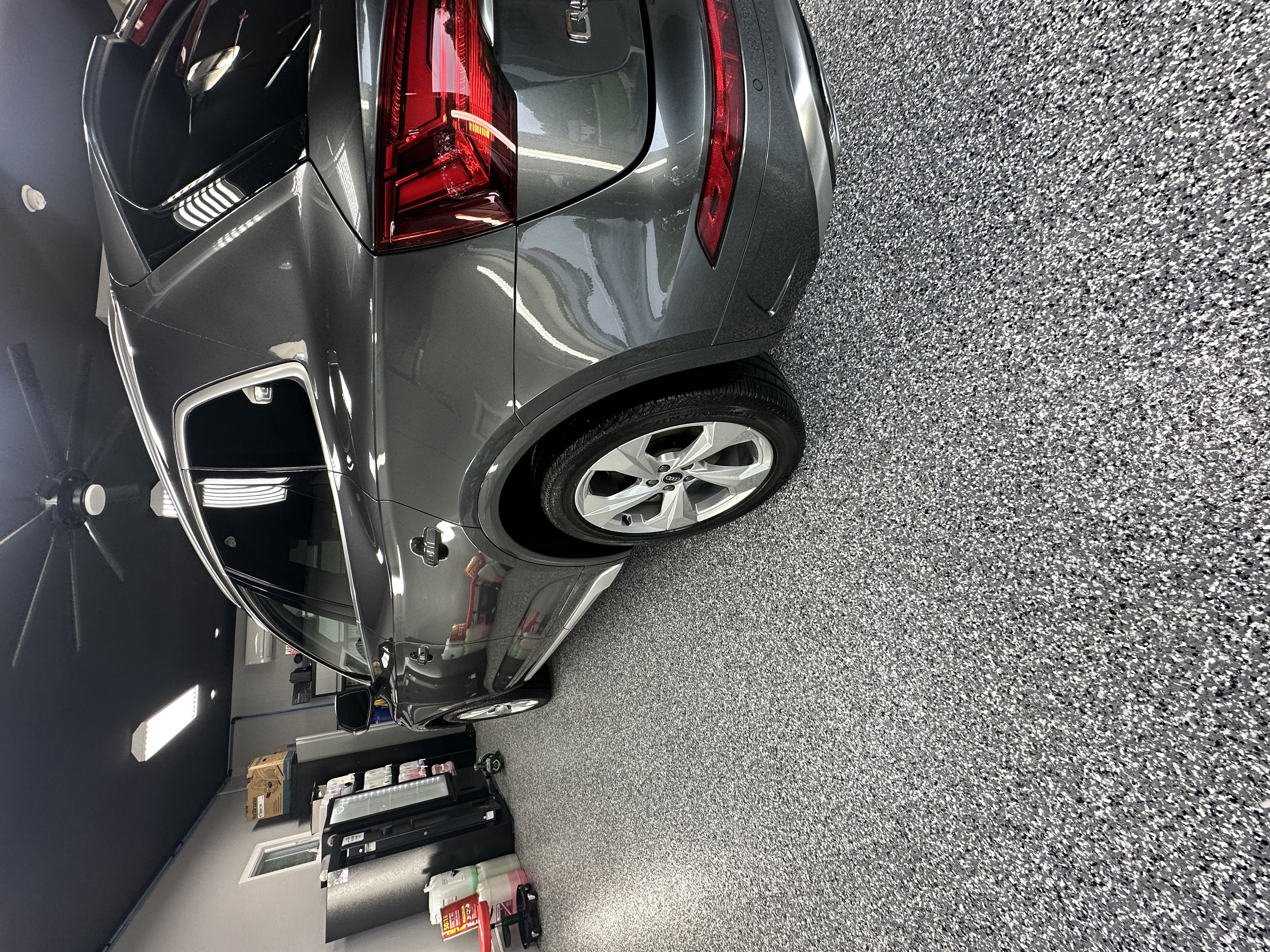 Vehicle in climate-controlled detail studio